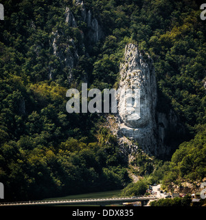 The statue of Decebalus, the King of Dacians, carved in the mountain rock above the Danube Valley, Romania. Stock Photo