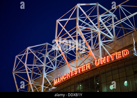 Manchester United's football stadium, Old Trafford, at night Stock Photo
