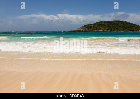 Atlantic Waves on Beautiful Golden Sandy Beach at Half Moon Bay Antigua Stock Photo