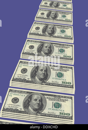 Row of 100 dollar bills on blue background Stock Photo
