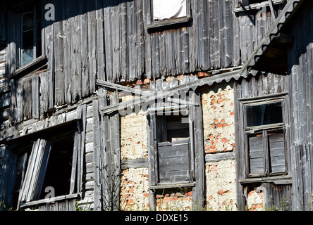 Old broken window on brick wall Stock Photo