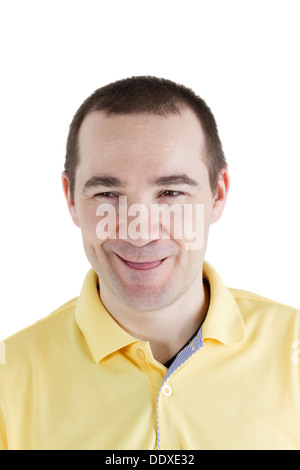 man narrowed his eyes and shows tongue on white background Stock Photo