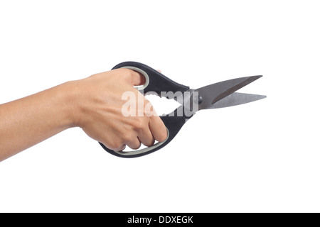 Woman hand holding a kitchen scissors isolated on a white background Stock Photo