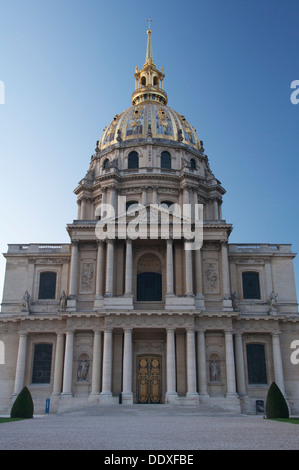 The façade of The Dome Church of St-Louis-des-Invalides, in Paris. This shining baroque masterpiece now houses Napoleon’s tomb. Landmarks of France. Stock Photo