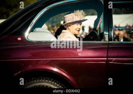 Braemar, Scotland, United Kingdom. September 7th, 2013: H.M. The Queen leaves the annual Braemer Highland Games at The Princess Royal and Duke of Fife Memorial Park Stock Photo