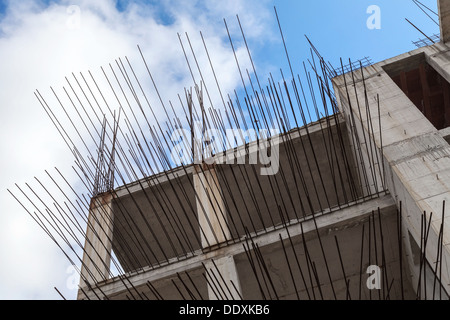 Modern building under construction, fragment with concrete walls and metal armature Stock Photo