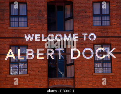 Welcome to Albert Dock sign, Gower Street, in Liverpool, at dusk / night , Merseyside , England , UK , the blue hour at UNESCO world heritage site Stock Photo