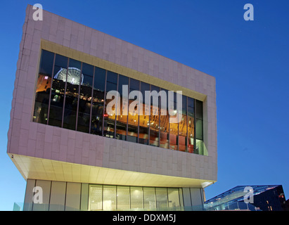 Albert Dock reflected in new museum at Nighttime liverpool Merseyside England UK Stock Photo
