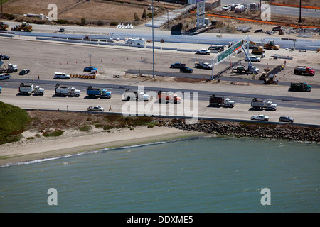 aerial photograph dump trucks at San Francisco Oakland Bay Bridge construction August 30, 2013 Stock Photo