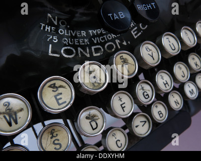 Old classic victorian typewriter machine. Black with ivory keys Stock Photo