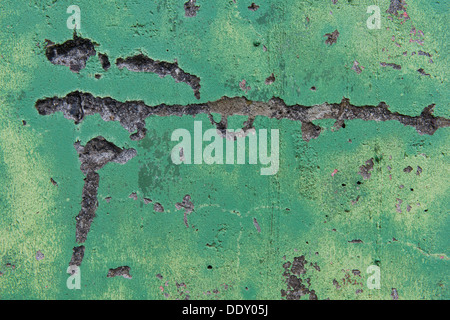 Decaying, green-painted wall Stock Photo