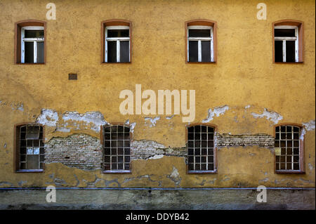 Facade on the Auer Muehlbach stream in need of renovation, Munich, Bavaria Stock Photo