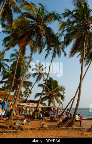 Flea market on the beach with palm trees, Anjuna, Goa, India, Asia Stock Photo