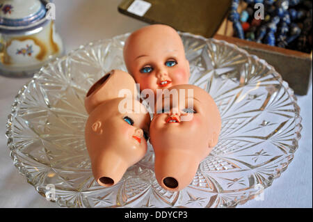 Doll heads at the Auer Dult annual market, Munich, Bavaria Stock Photo