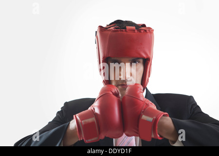 Portrait of businessman with boxing gloves Stock Photo