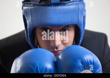 Portrait of businessman with protective headgear Stock Photo