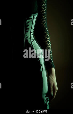 Woman, Gothic, glossy outfit, arm, hip Stock Photo