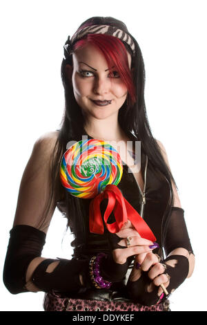 Gothic woman holding a lolli Stock Photo