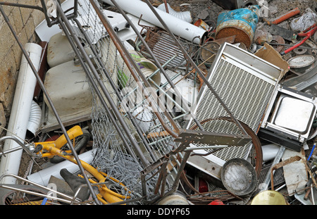 old irons left in a landfill hazardous metals and abusive rusted Stock Photo