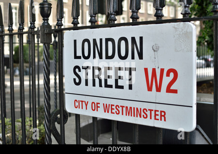 London Street W2 City of Westminster street sign on railings, Paddington, London, UK. Stock Photo