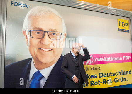 Berlin, Germany. 09th Sep, 2013. Chairman and top candidate of the Free Democratic Party (FDP) for the upcoming federal elections, Rainer Bruederle, presents a new election poster of his party for the final phase of their campaign in Berlin, Germany, 09 September 2013. Photo: Maurizio Gambarini/dpa/Alamy Live News