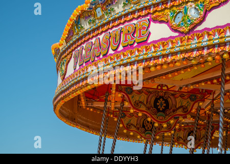 Close up of the word pleasure on a merry go round Stock Photo