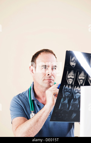 Doctor looking at an X-ray Stock Photo