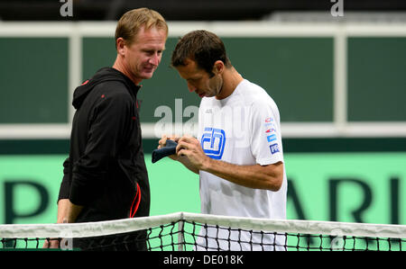 Prague, Czech Republic. 9th Sep, 2013. Czech tennis player Radek Stepanek (right) trains under the supervision of Petr Korda prior to the Davis Cup semifinal match Czech Republic vs Argentina in Prague, Czech Republic, September 9, 2013. Credit:  Michal Kamaryt/CTK Photo/Alamy Live News Stock Photo