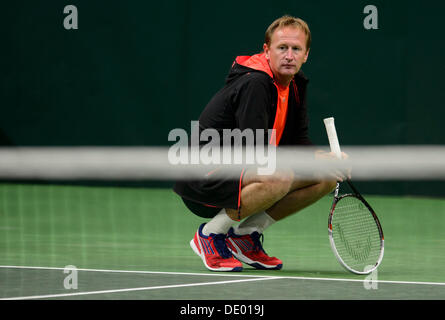 Prague, Czech Republic. 9th Sep, 2013. Czech tennis player Radek Stepanek trains under the supervision of Petr Korda (pictuted) prior to the Davis Cup semifinal match Czech Republic vs Argentina in Prague, Czech Republic, September 9, 2013. Credit:  Michal Kamaryt/CTK Photo/Alamy Live News Stock Photo