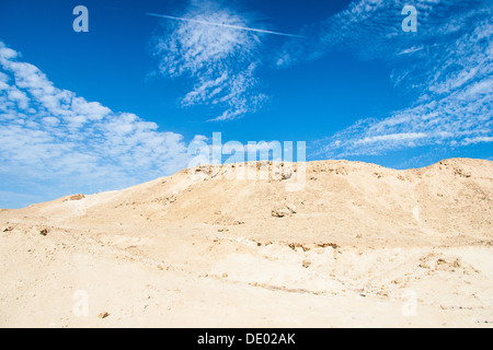 Sand dunes and rocks, Sahara Desert Stock Photo