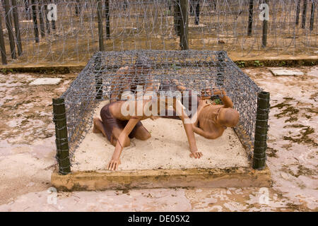 Former prison for prisoners of war on Phu Quoc Island, now a museum, sculptures depict the conditions of detention Stock Photo