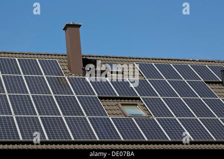 Solar Panels On The Roof Of A Private Building. Environmentally 