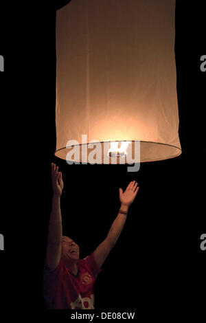 Ascending hot air balloon at the Loi Krathong Festival of Light Stock Photo