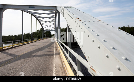Closeup of riveted iron arch bridge steel girder arnd rivets , Finland Stock Photo