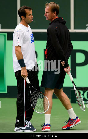 Prague, Czech Republic. 9th Sep, 2013. Czech tennis player Radek Stepanek (left) trains under the supervision of Petr Korda prior to the Davis Cup semifinal match Czech Republic vs Argentina in Prague, Czech Republic, September 9, 2013. © Michal Kamaryt/CTK Photo/Alamy Live News Stock Photo