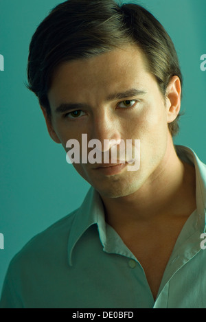 Handsome man looking seductively at camera, portrait Stock Photo