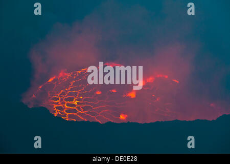 Boiling lava lake in the crater of Mount Nyiragongo volcano Stock Photo