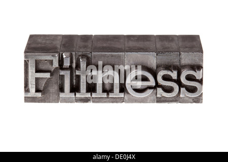 Old lead letters forming the word Fitness Stock Photo