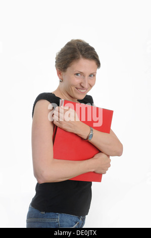 Young woman holding a red folder Stock Photo