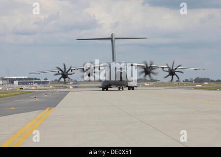 Airbus Type A400M military cargo plane landing at Berlin-Schoenefeld Airport, International Aviation and Aerospace Exhibition Stock Photo