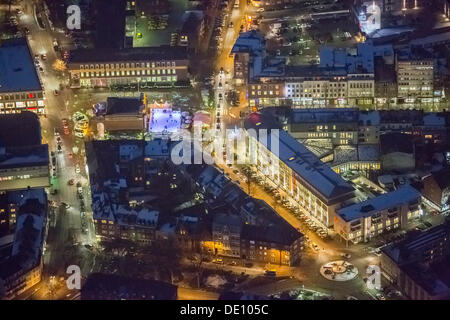Aerial view, night shot, Berliner Tor gate with with ice rink, Berliner-Tor-Platz square Stock Photo