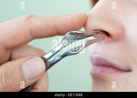 Examination of nose by ear, nose and throat specialist Stock Photo