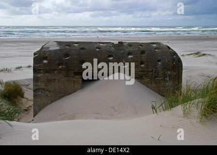 Old German bunker with bullet holes on the beach, Henne Strand, West Jutland, Denmark, Europe Stock Photo