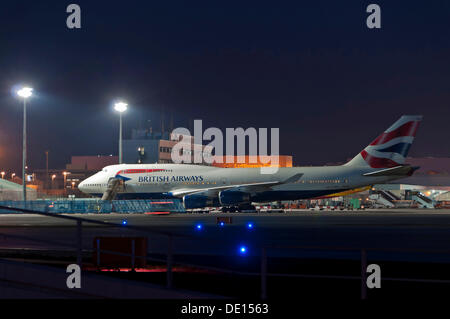 British Airways Boeing 747-436 at the CargoCity North Terminal of Frankfurt Airport at Night, Frankfurt, Hesse, PublicGround Stock Photo