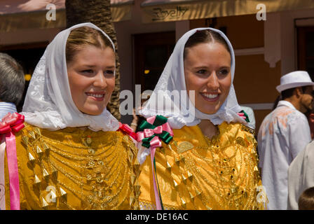 Young women wearing the typical traditional costume and traditional gold jewelry called Emprendada, Ibiza, Spain, Europe Stock Photo