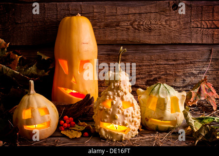 Halloween pumpkins in night on wooden boards Stock Photo