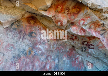 Rock painting of the Cueva de Las Manos, Cave of the Hands, UNESCO World Heritage Centre, Santa Cruz province, Argentina Stock Photo