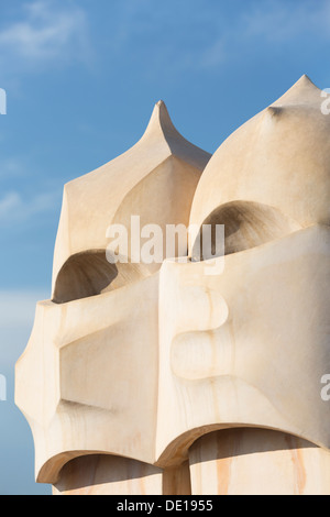 Spain, Barcelona, sculpture detail on the roof of Casa Mila (La Pedrera), designed by Antonio Gaudi. Stock Photo