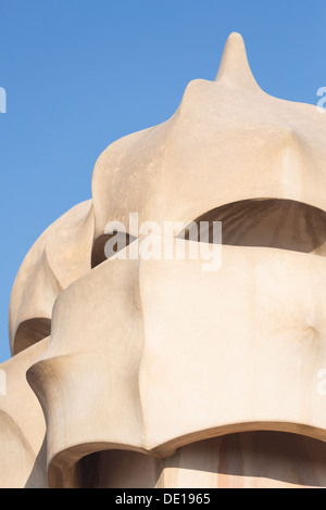 Spain, Barcelona, sculpture detail on the roof of Casa Mila (La Pedrera), designed by Antonio Gaudi. Stock Photo