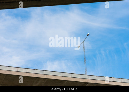 Low angle view of overpass and blue sky in Stockholm, Sweden Stock Photo